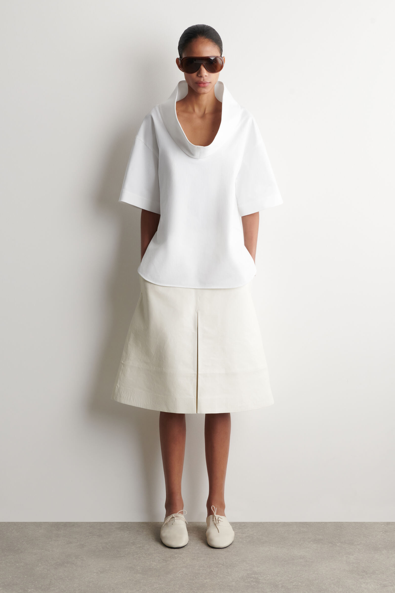 ボリューム ファネルネックトップ